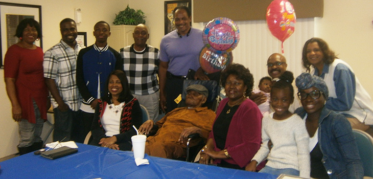 Malachi surrounded by his family