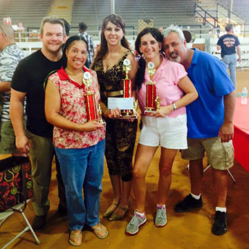 chili cookoff winners with their trophies