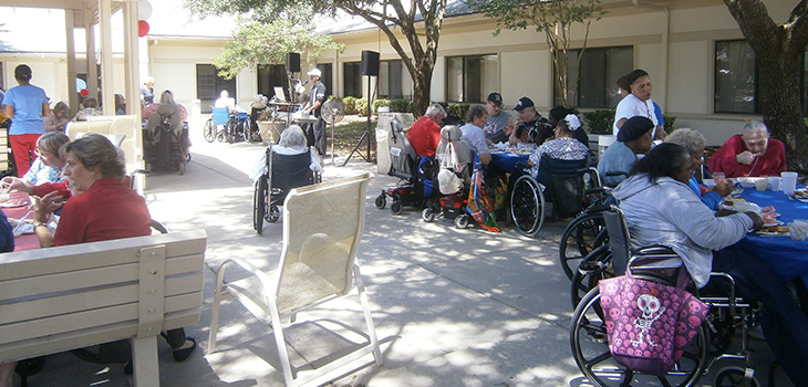 residents outside enjoying the memorial day bbq