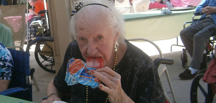resident eating a popsicle